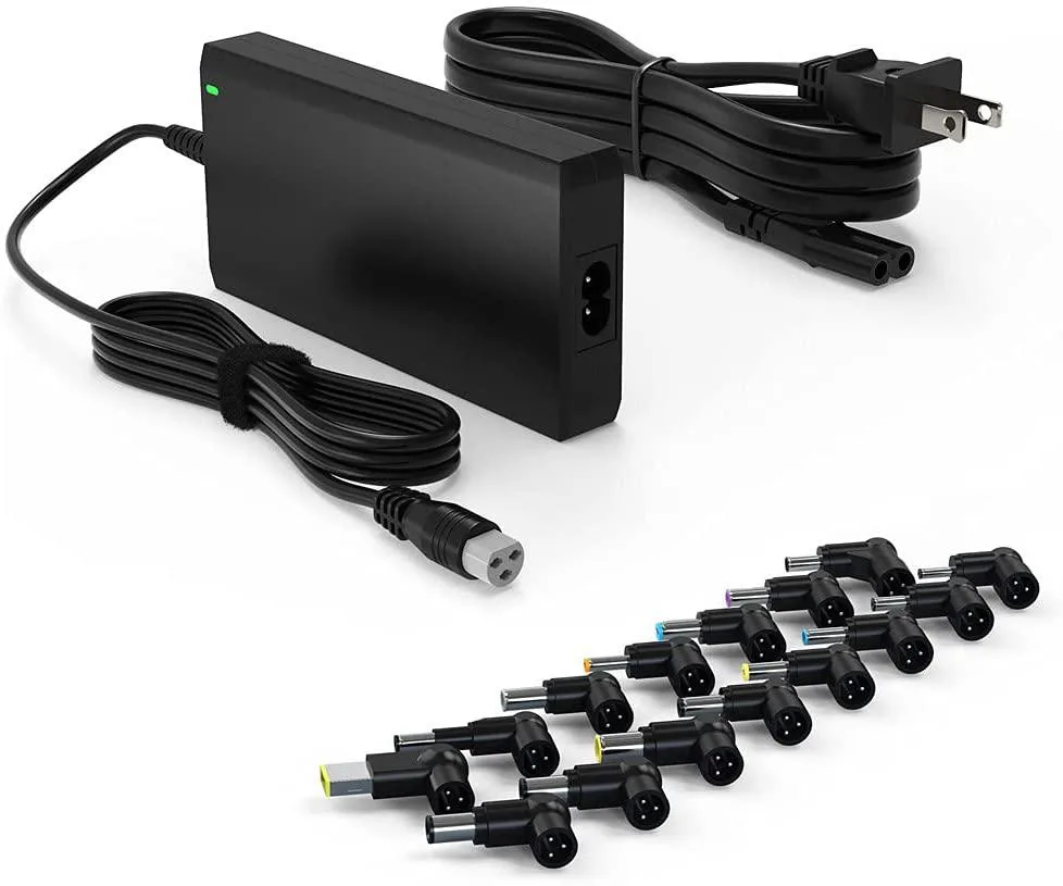 Compact black rectangular power brick with detachable cable and interchangeable tips