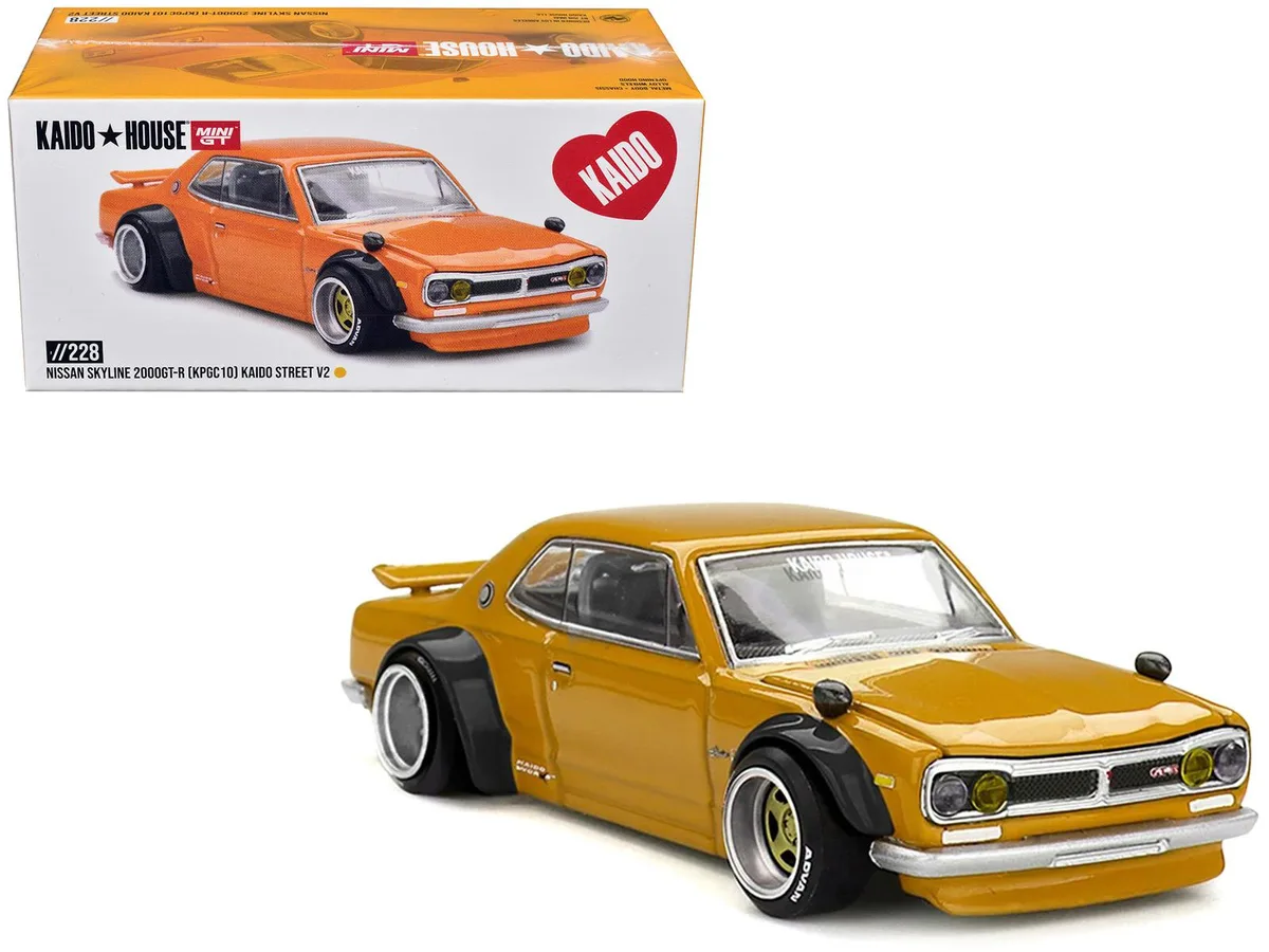 Mini GT Mini GT Nissan Skyline 2000GT-R KPGC10 RHD Kaido Street V2 Yellow Kaido House 1/64 Diecast Hobby Collectible — product photo