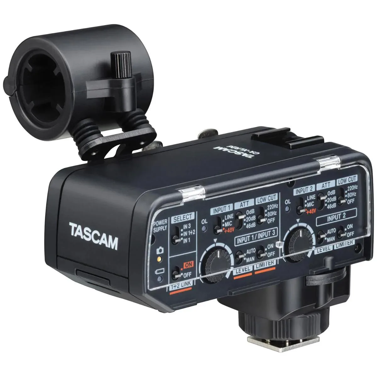 Compact black XLR audio adapter with hot shoe mount and multiple input jacks