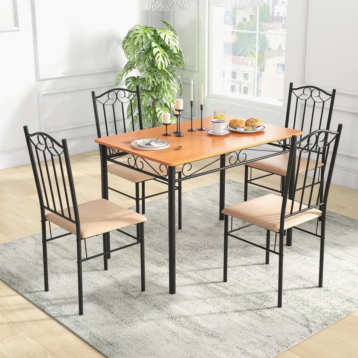 Black five-piece dining set with 30-inch table and four chairs, steel frame and MDF tops