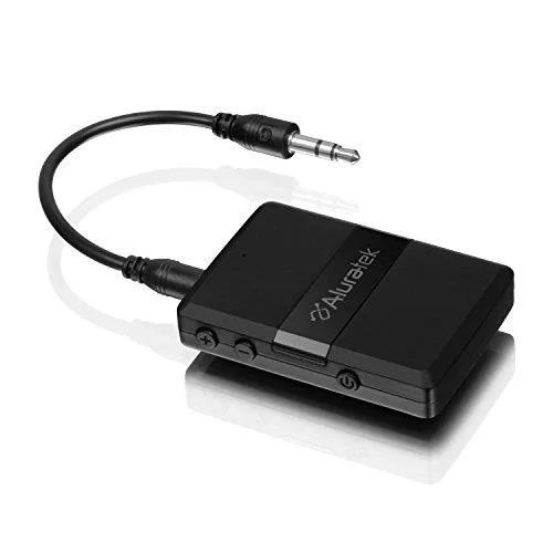 Small black rectangular Bluetooth adapter with switch and ports