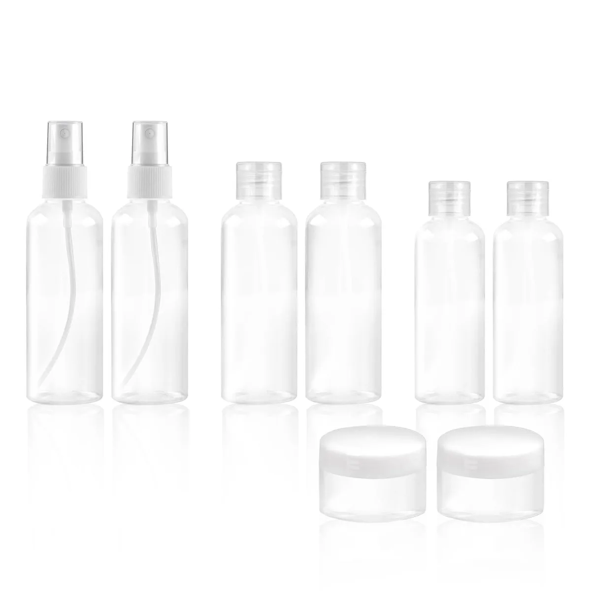 Eight-piece travel bottle set in black and white with flip-top bottles, spray bottles and cream jars