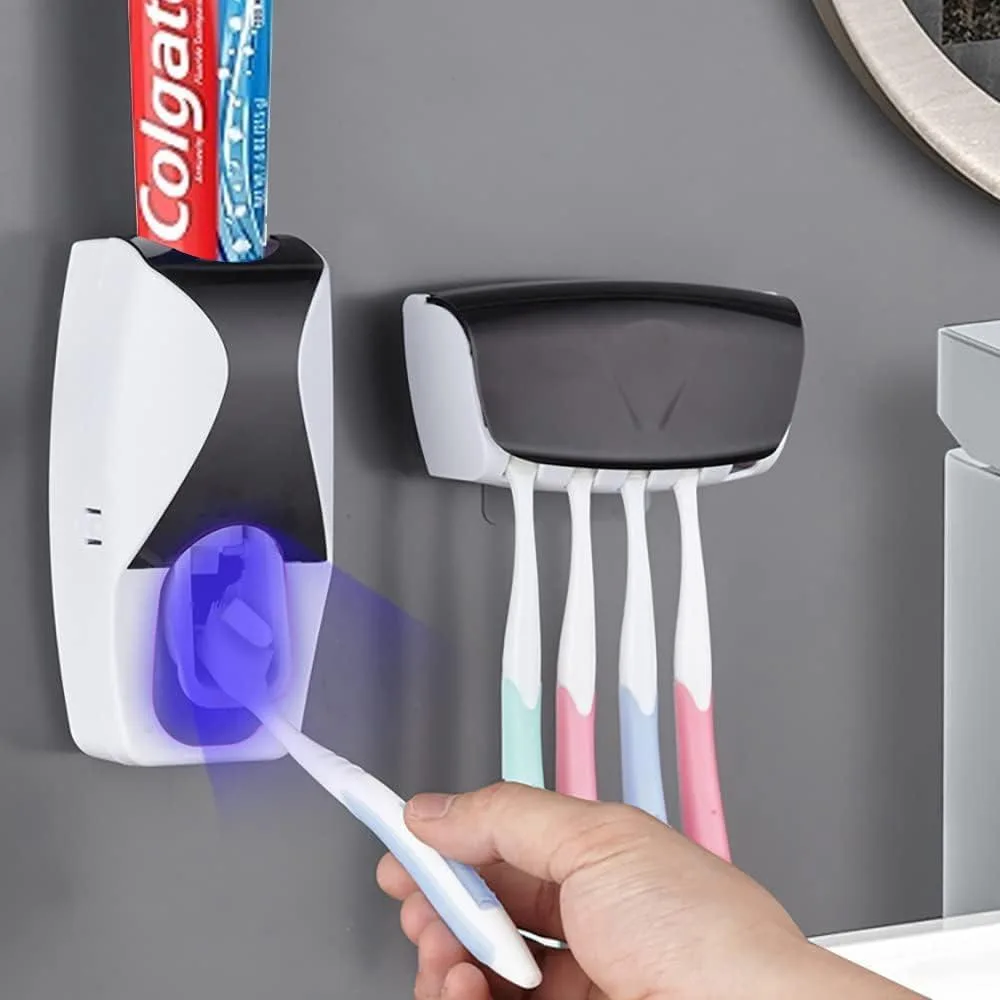 White wall-mounted automatic toothpaste dispenser with toothbrush holders, ABS plastic finish