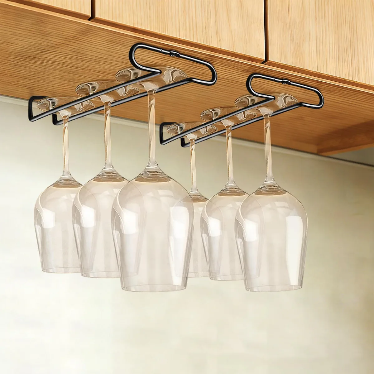 Two red under-cabinet wine glass racks, each with a curved metal frame and mounting holes