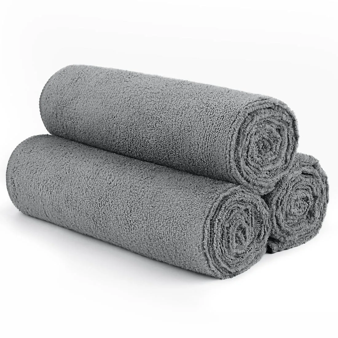Three folded grey microfiber towels stacked 16 by 27 inches