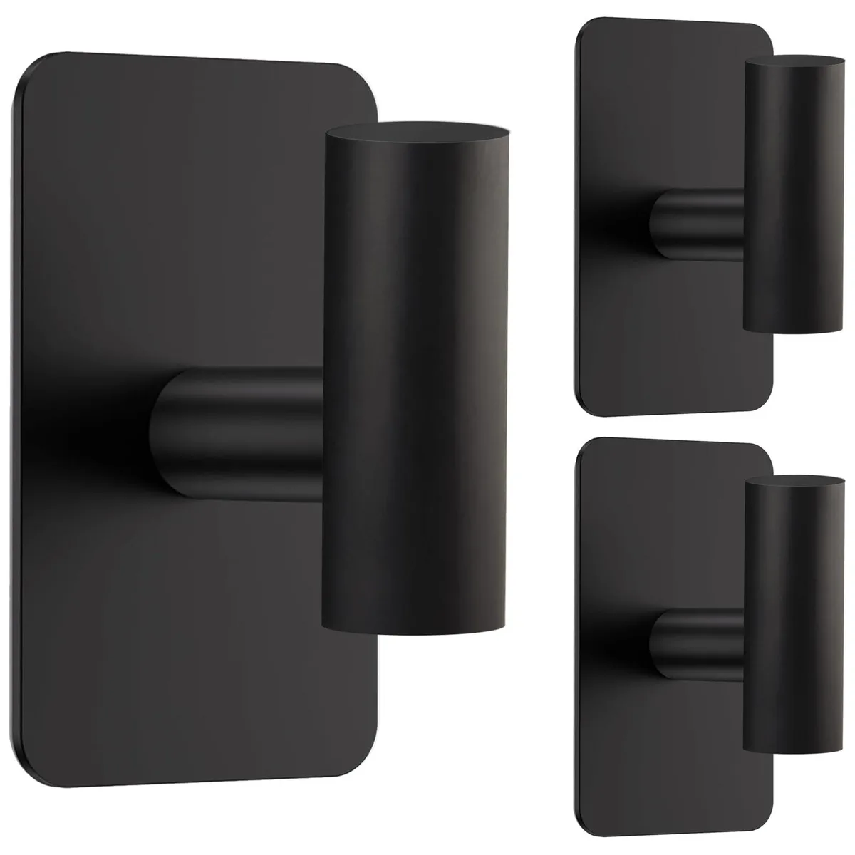 Three black adhesive hooks on a white background