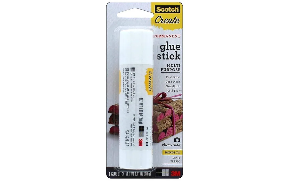White glue stick in a rectangular plastic tube with a twist base