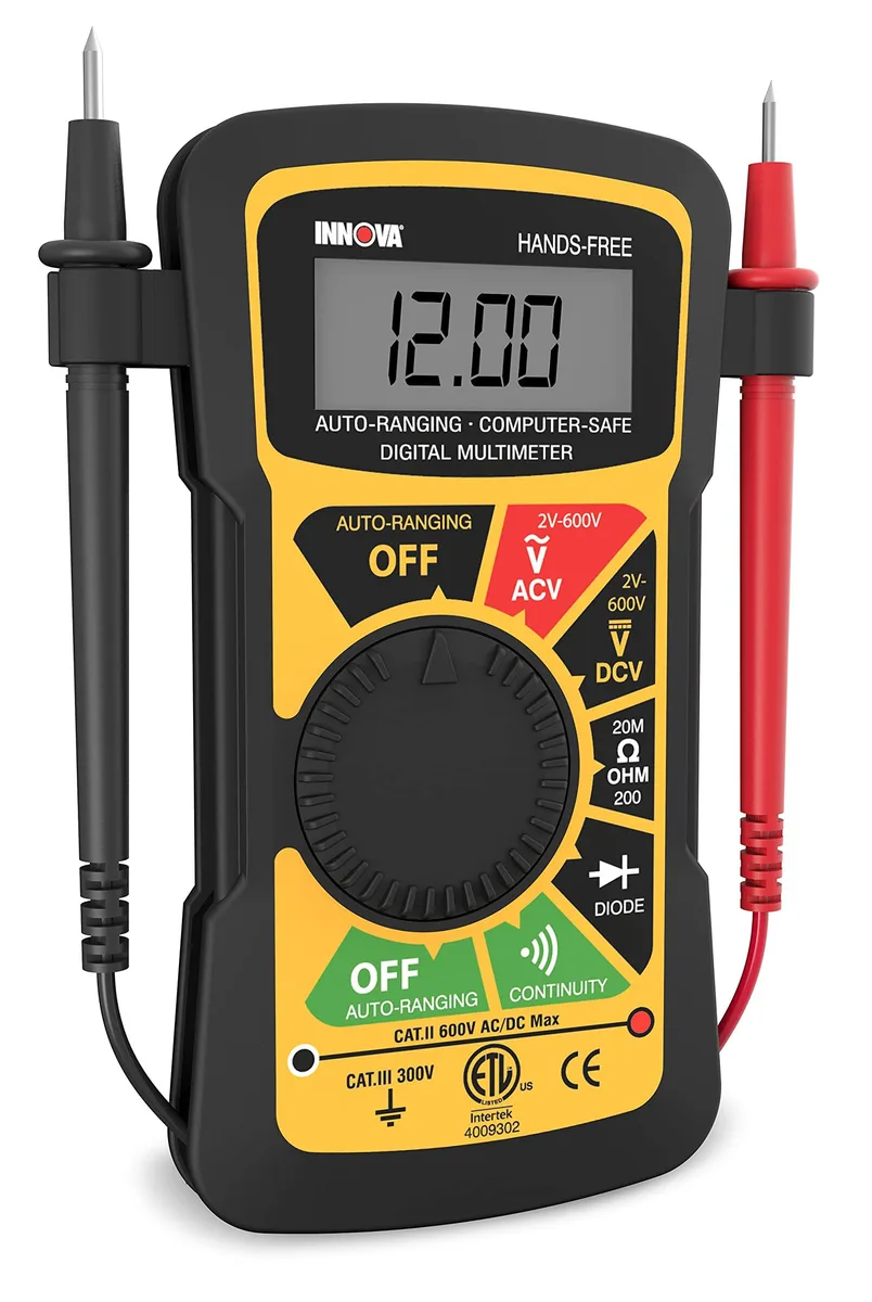 Black rectangular digital multimeter with wrist-mounted band and stand
