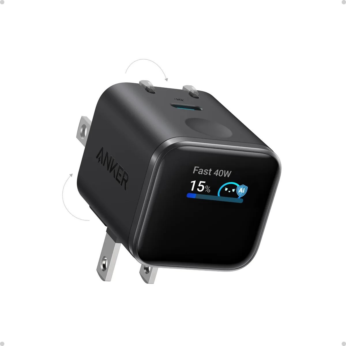 Compact white USB-C wall charger with built-in smart display and foldable prongs
