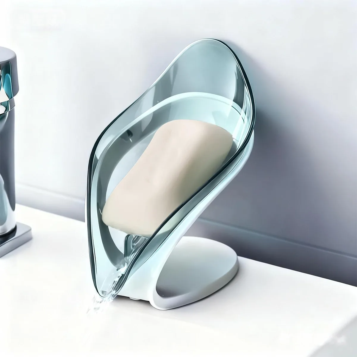 Blue leaf-shaped self-draining soap dish with detachable base and tray