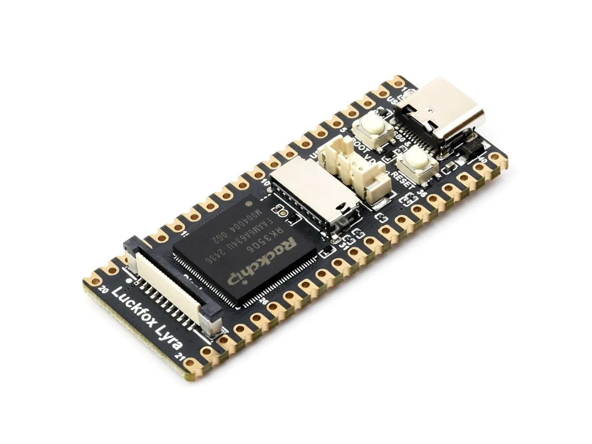 Small green rectangular circuit board with chips and connectors, no pin headers fitted