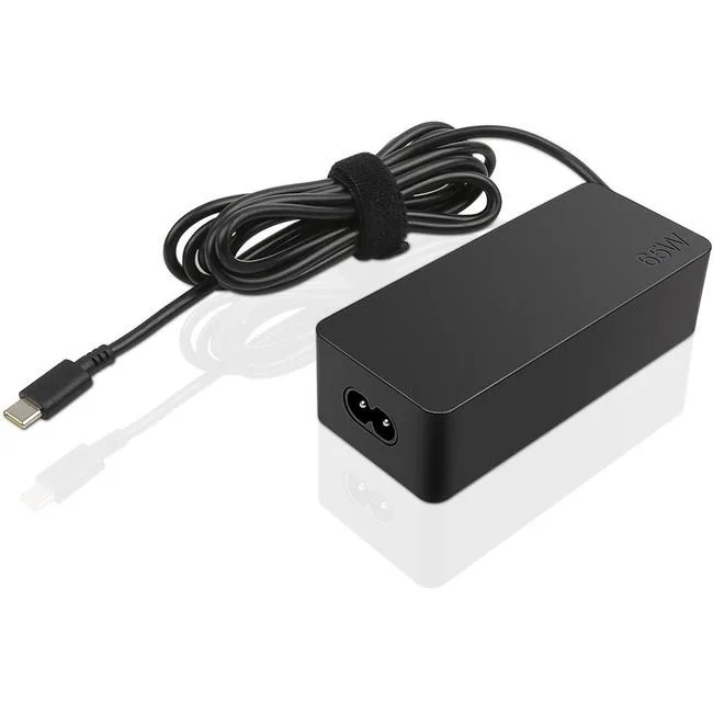Compact black rectangular AC adapter with USB port, 1.1 by 1.8 by 4.3 inches