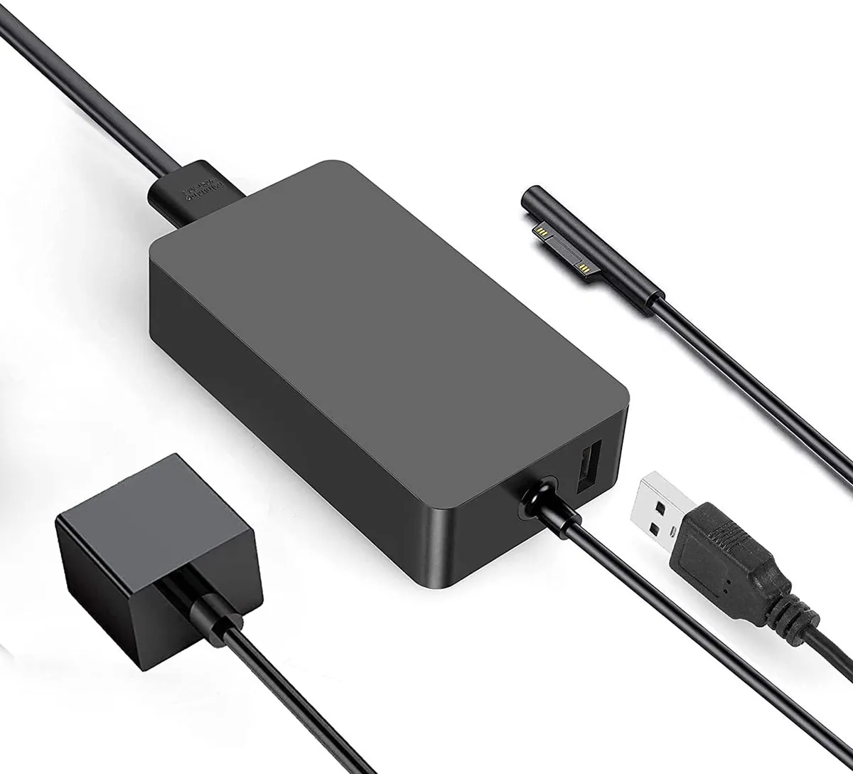 Compact black wall charger with detachable AC cable and integrated USB port