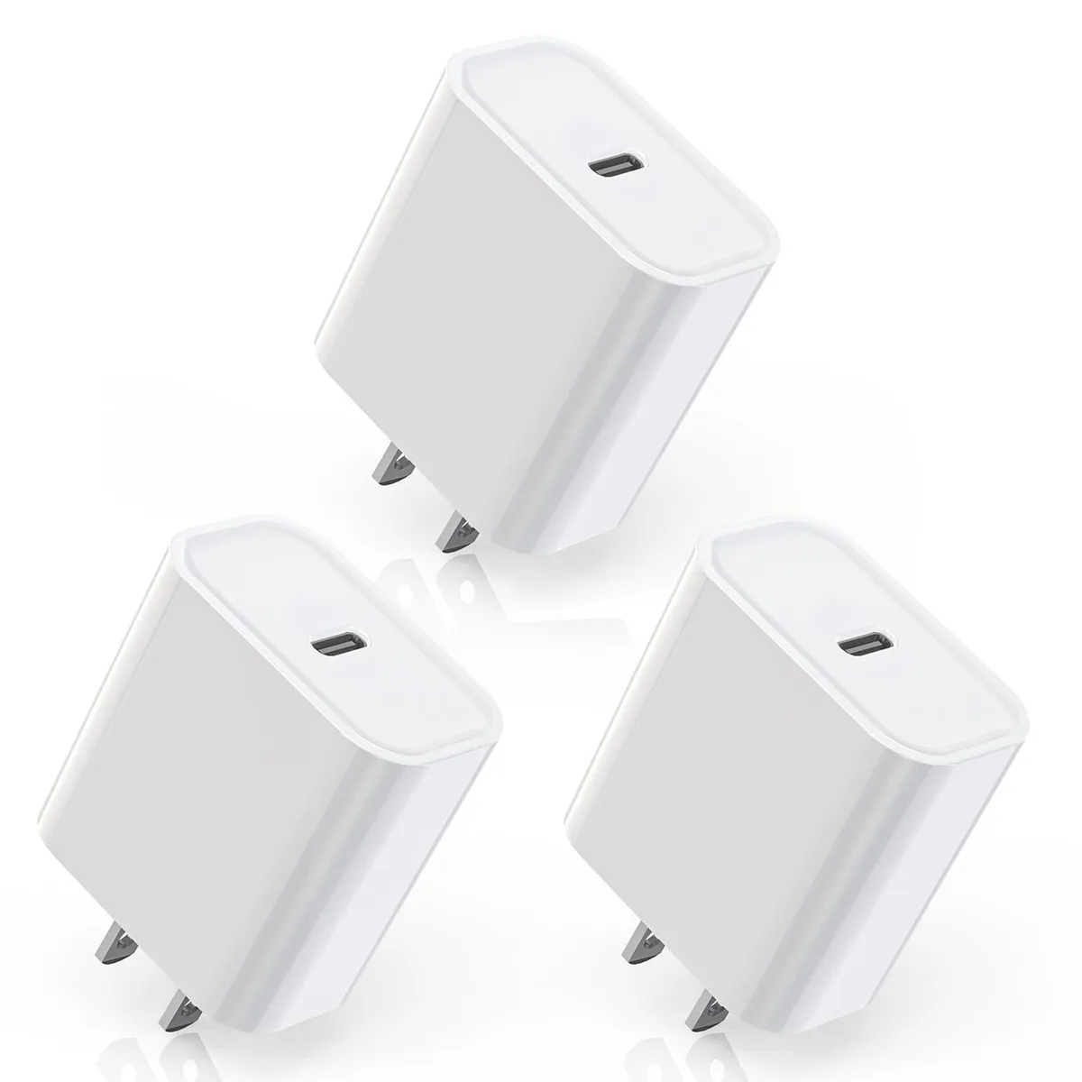 Three white compact USB-C wall chargers with folding prongs