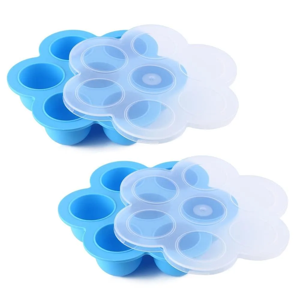 Two blue silicone egg bite molds, oval shape, each with seven round cavities
