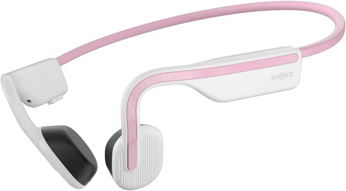 Pink open-ear bone conduction headphones with wraparound titanium frame