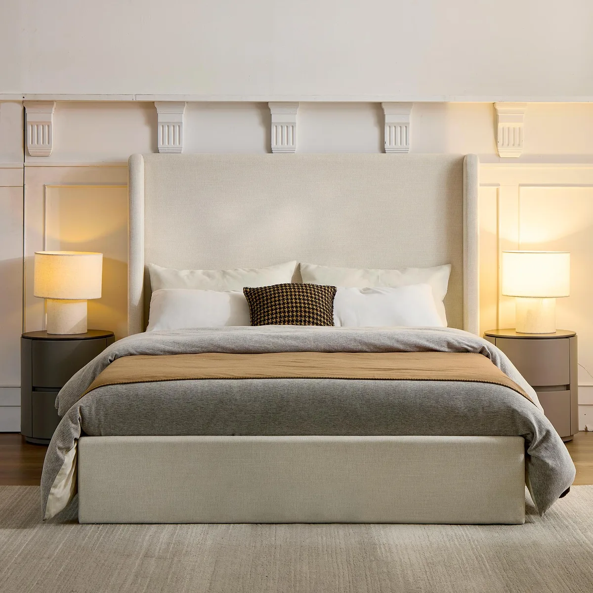 King-size upholstered wingback bed frame in ivory textured chenille with tall curved headboard