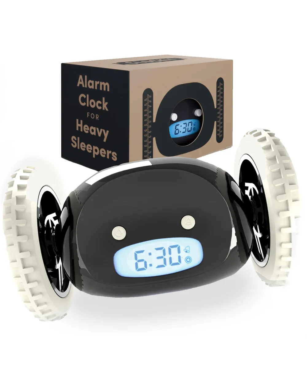 Small black digital alarm clock on wheels, about 5.25 by 3.5 inches
