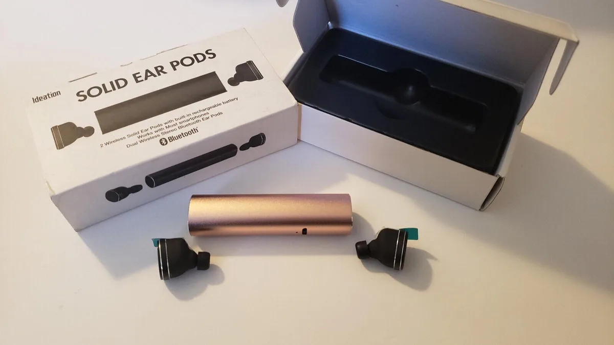 Gold wireless ear pods with matching charging case