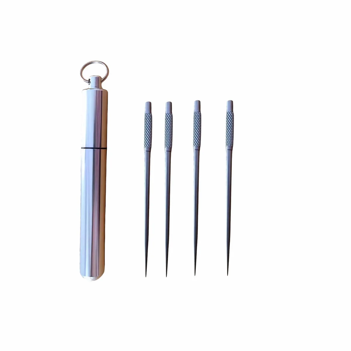 Four silver titanium alloy toothpicks inside a polished metal holder with a keychain loop