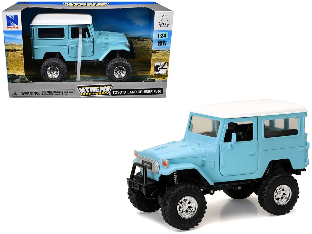 New Ray Toys New Ray Toys Toyota Land Cruiser FJ40 Light Blue White Top Xtreme Off-Road 1/24 Diecast Hobby Collectible — product photo