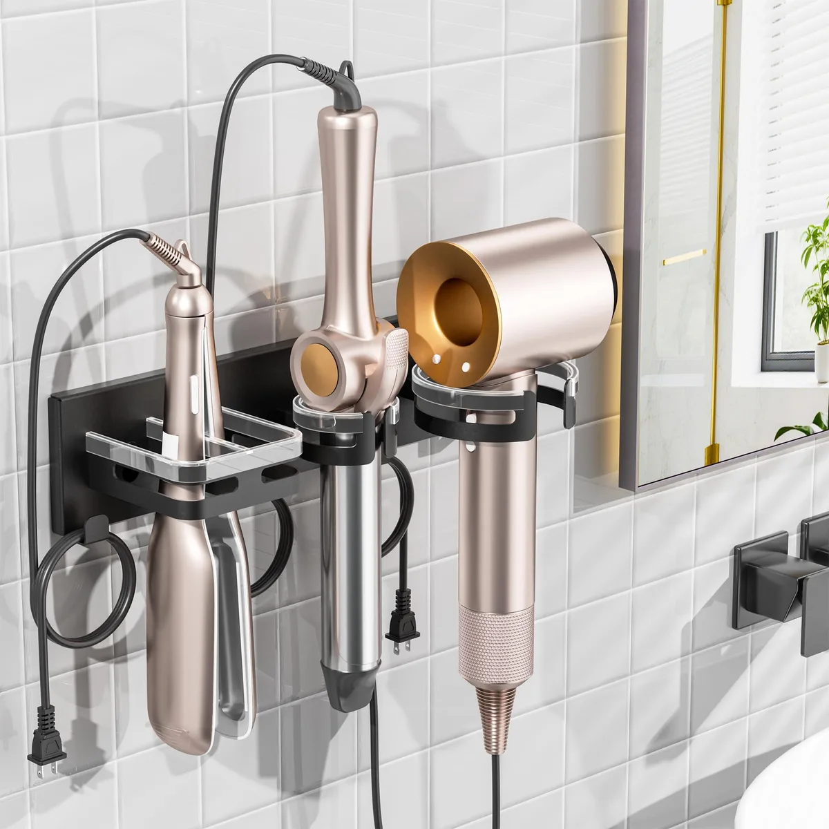 Black metal wall-mounted holder with slots for hair dryer, straightener and curling iron