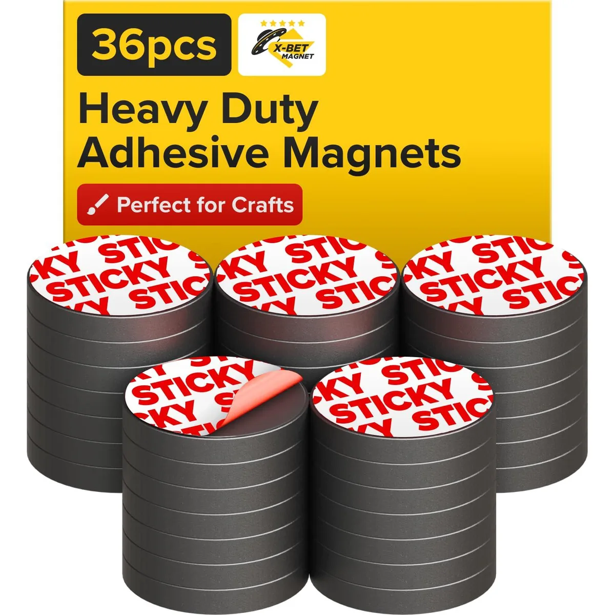 36 small grey ceramic discs with adhesive backing on a card