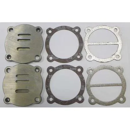 Two brass valve assemblies with threaded bases and spring-loaded tops