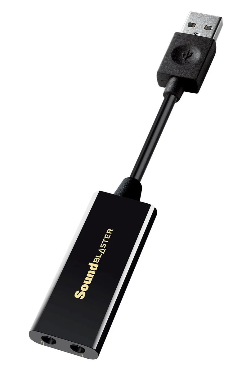 Small black USB sound adapter with headphone and microphone ports