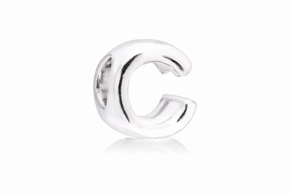 Sterling silver charm shaped like the letter C
