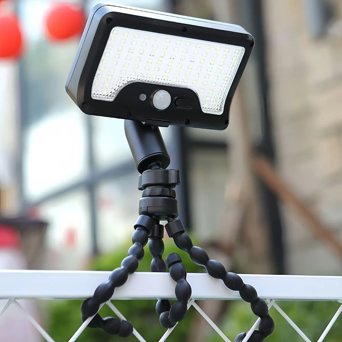 White rectangular solar light with clip and flexible octopus tripod stand, clear prismatic lens, 92 LEDs