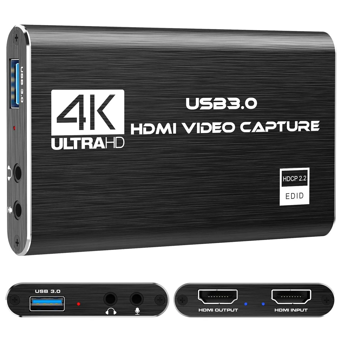 Small black rectangular capture card with HDMI ports and microphone jack