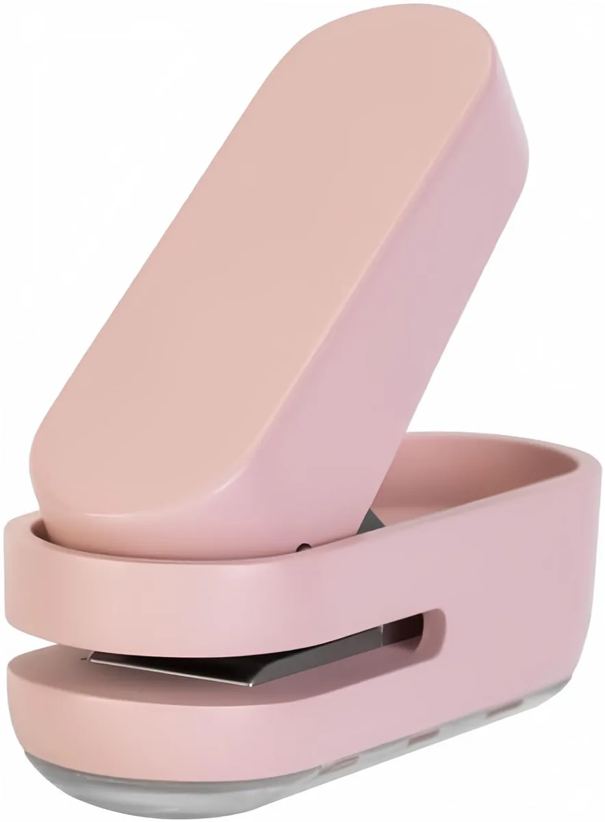 Pink mini single-hole puncher with storage base