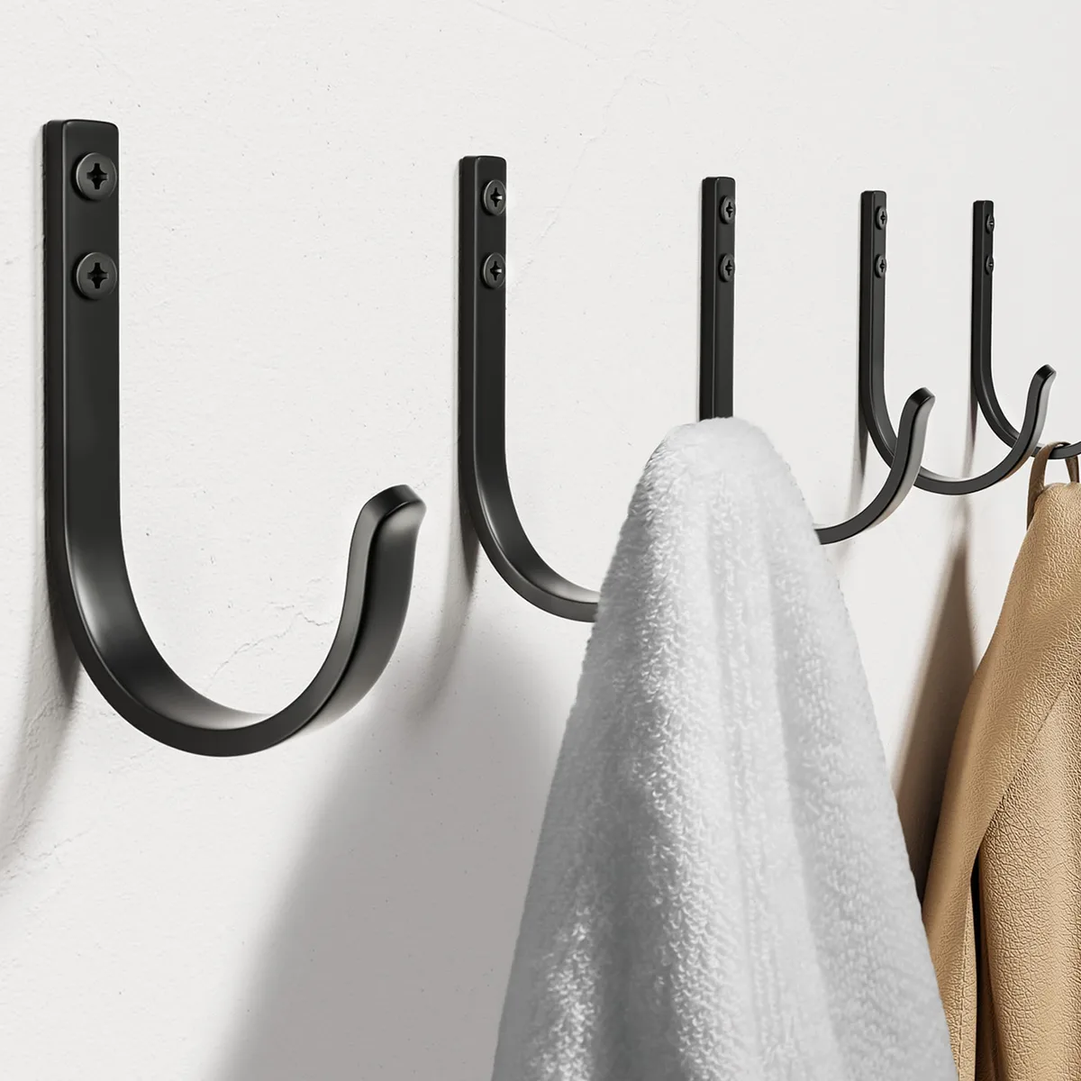 Five black metal screw-in wall hooks with smooth finish