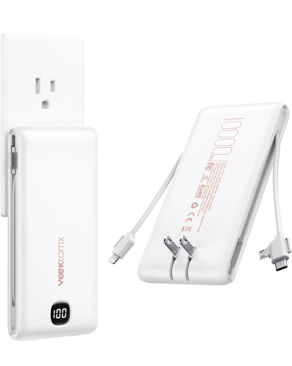 Rectangular matte white power bank with fold-out AC prongs and built-in cables, digital display on front