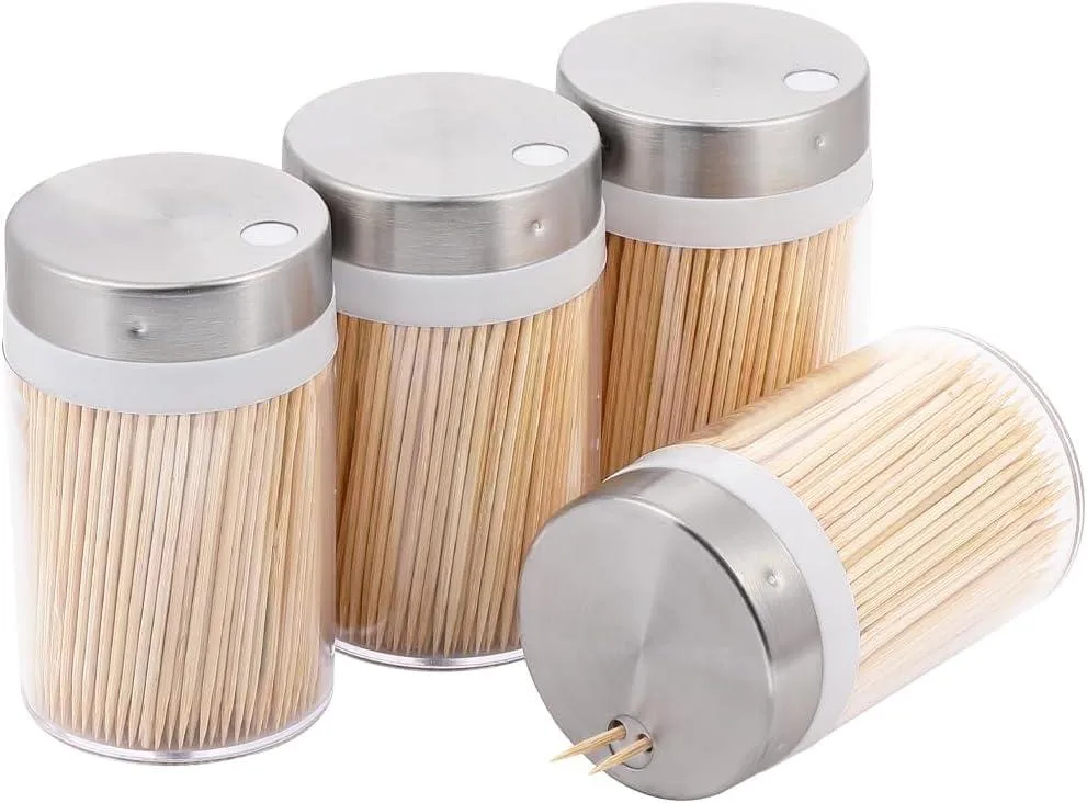 Black stainless steel ice bucket with four clear toothpick dispensers and bamboo picks