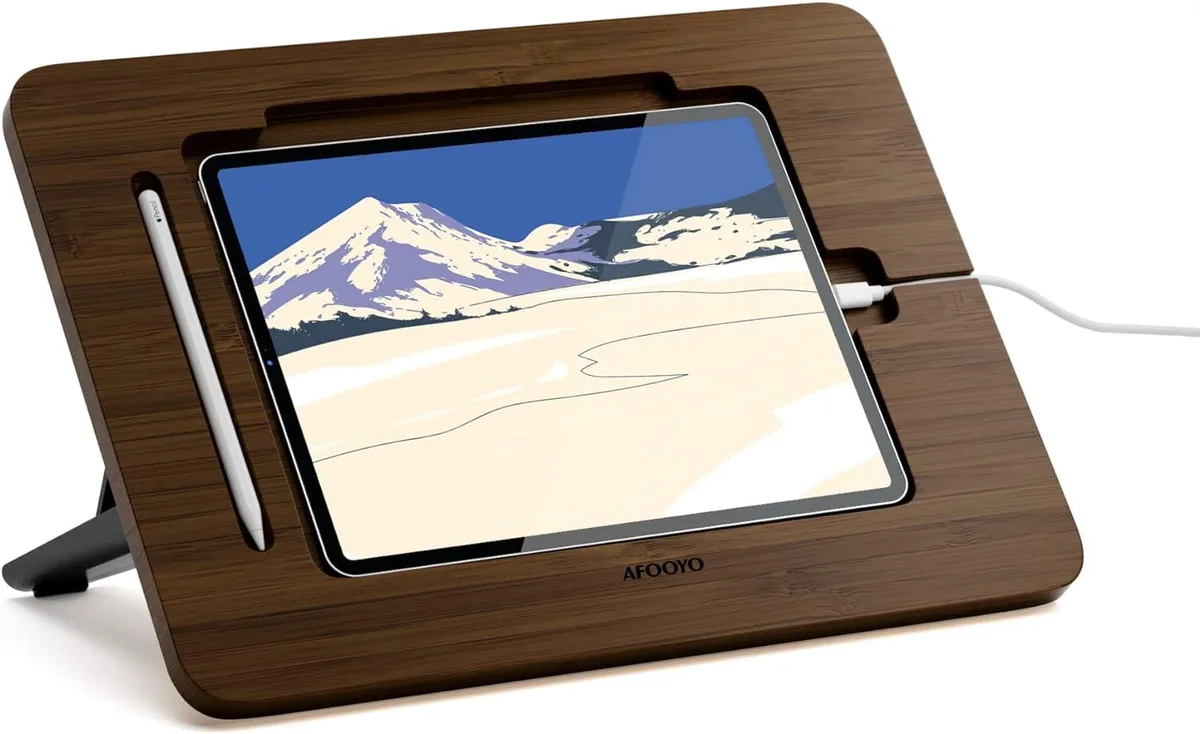 Walnut-finished bamboo tablet stand with adjustable angles and pen slot