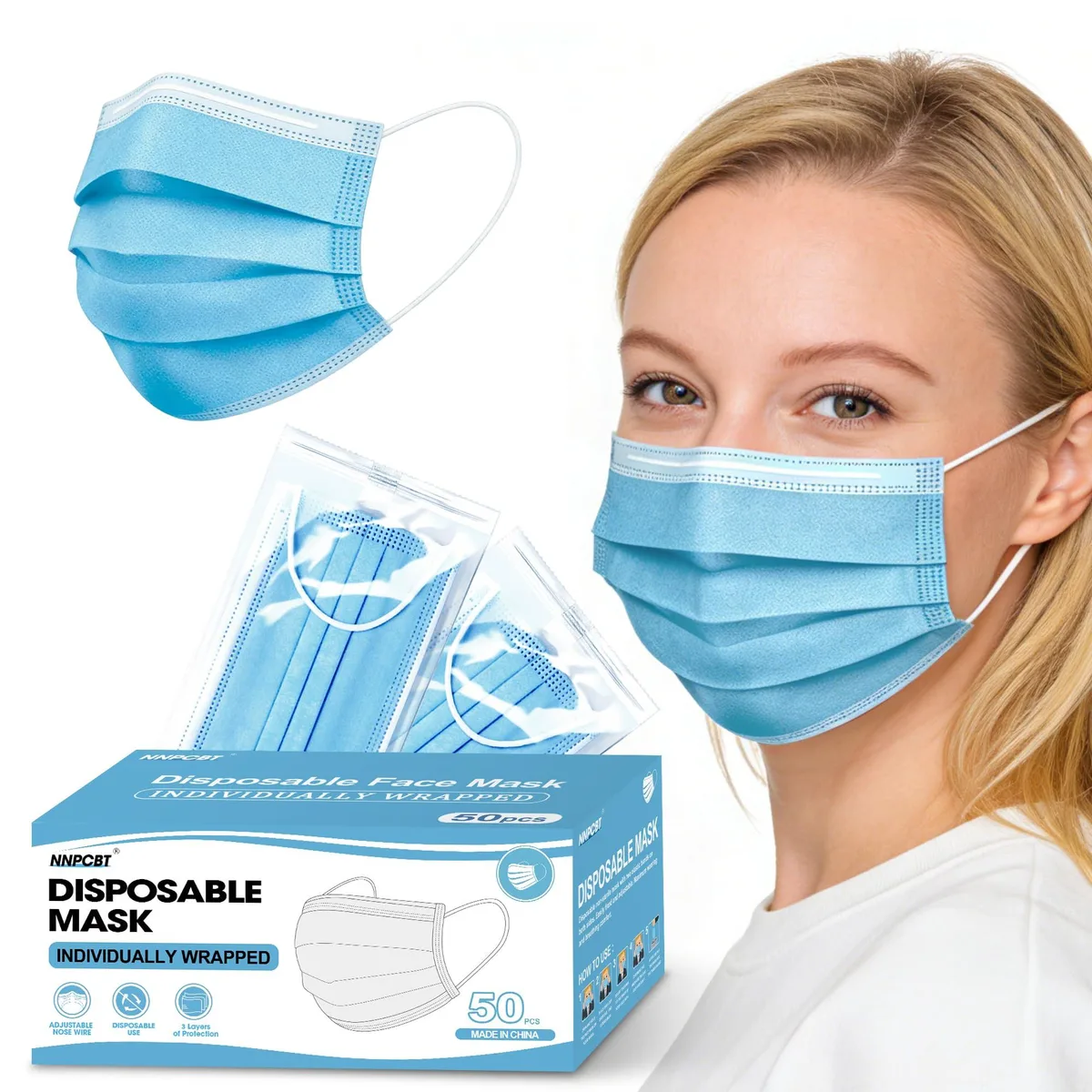 A pack of 50 blue disposable face masks, individually wrapped, with elastic ear loops and a nose wire