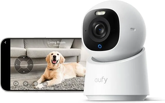 White cylindrical indoor camera on a swivel base with a front lens and spotlight ring