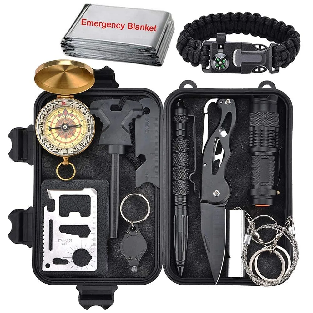 Compact black plastic case holding 29-piece survival kit with bracelet, whistle, fire starter, blanket, compass, flashlight and tools
