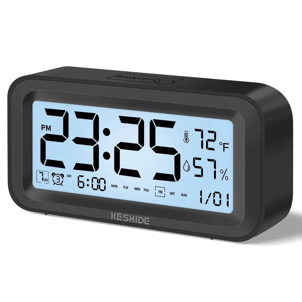 Compact black rectangular digital clock with top-mounted buttons and a clear display showing time temperature humidity