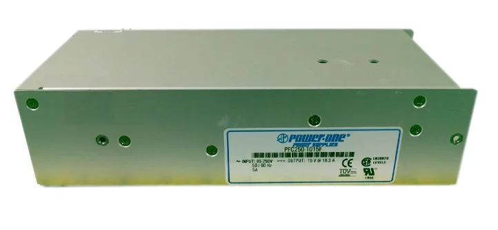 Rectangular silver metal power supply unit with ventilation slots and terminal connections