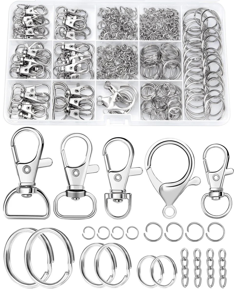 Open compartmented plastic box holding 325 silver keychain clips rings and hooks