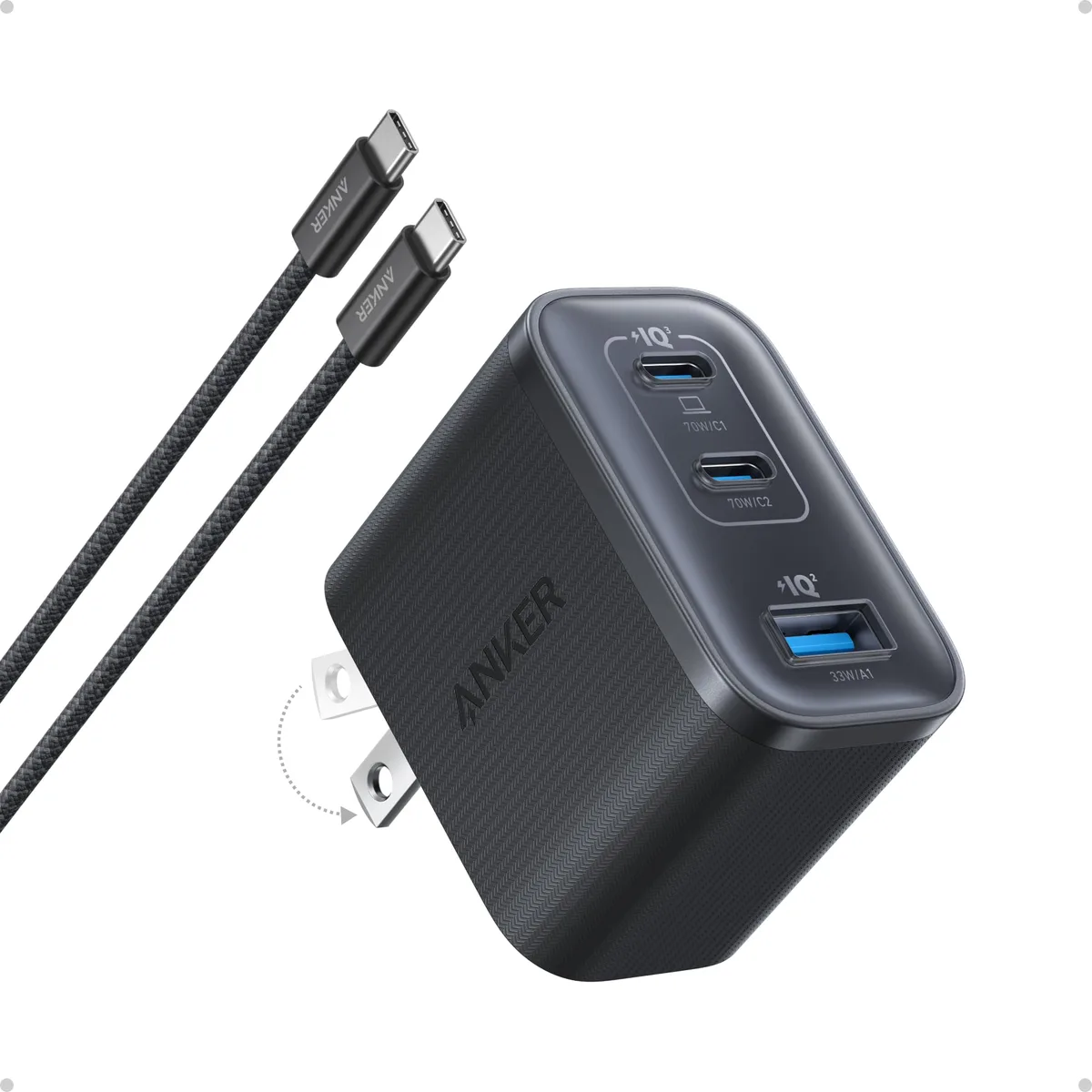 Compact black three-port USB-C charger with textured shell and glossy finish, includes cable