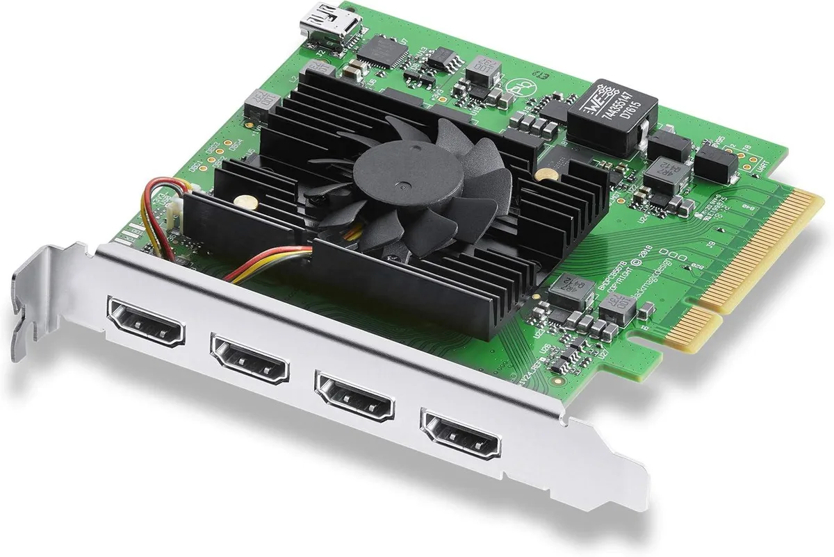 Black PCIe card with four HDMI ports on a metal bracket