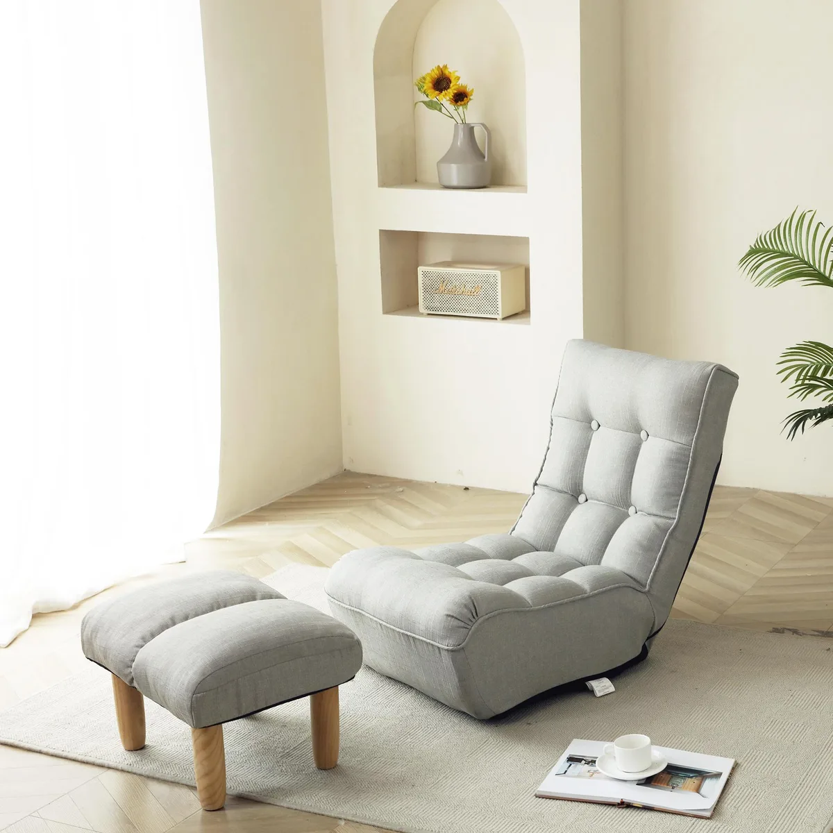 Grey linen floor chair with adjustable backrest, folded flat