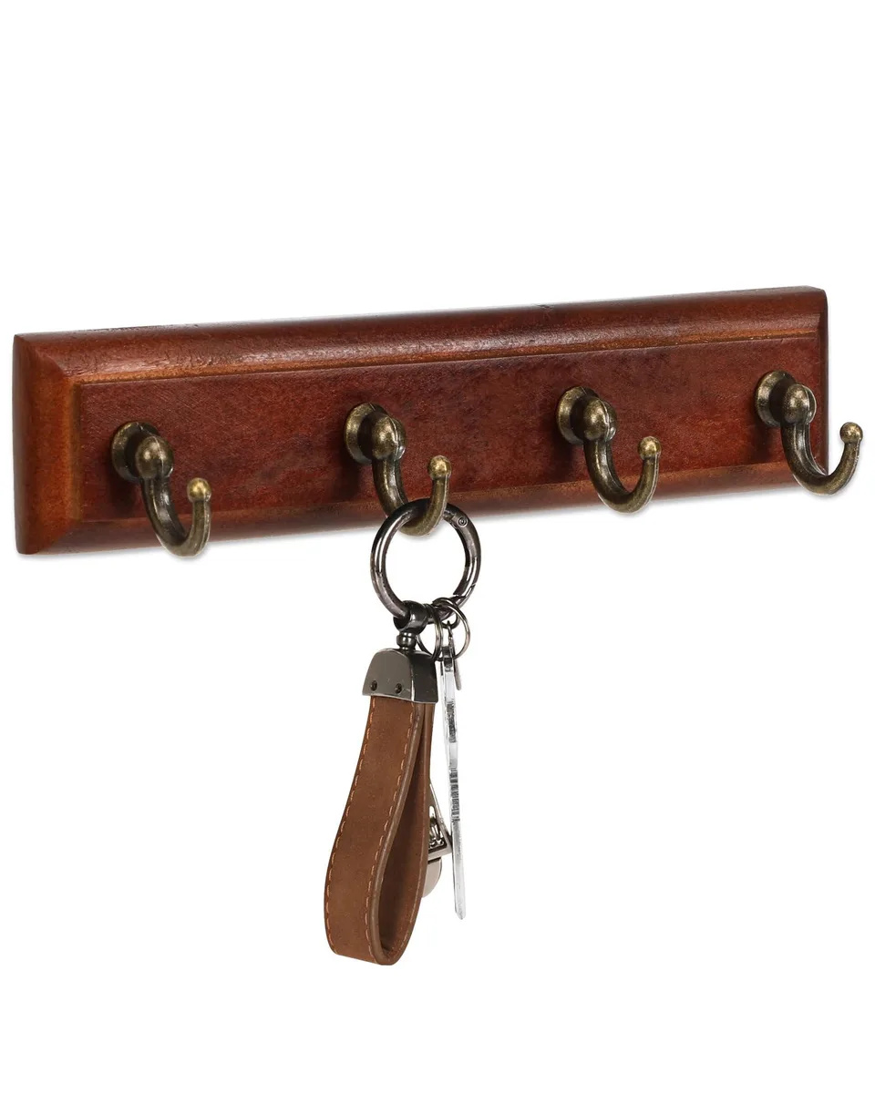 Brown wooden key rack with four metal hooks, adhesive mounted
