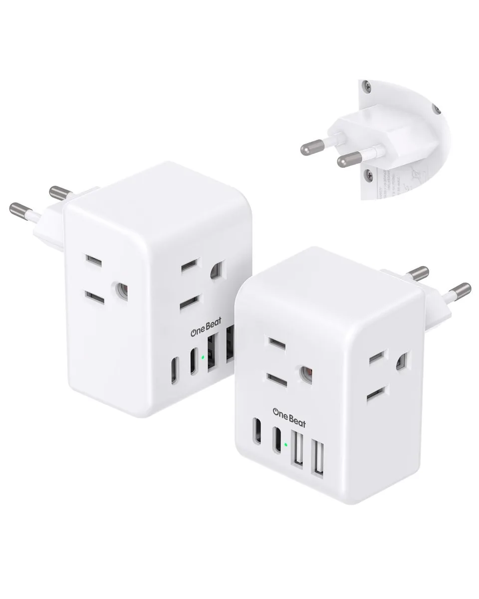 Two compact white EU travel adapters with three AC outlets and four USB ports each