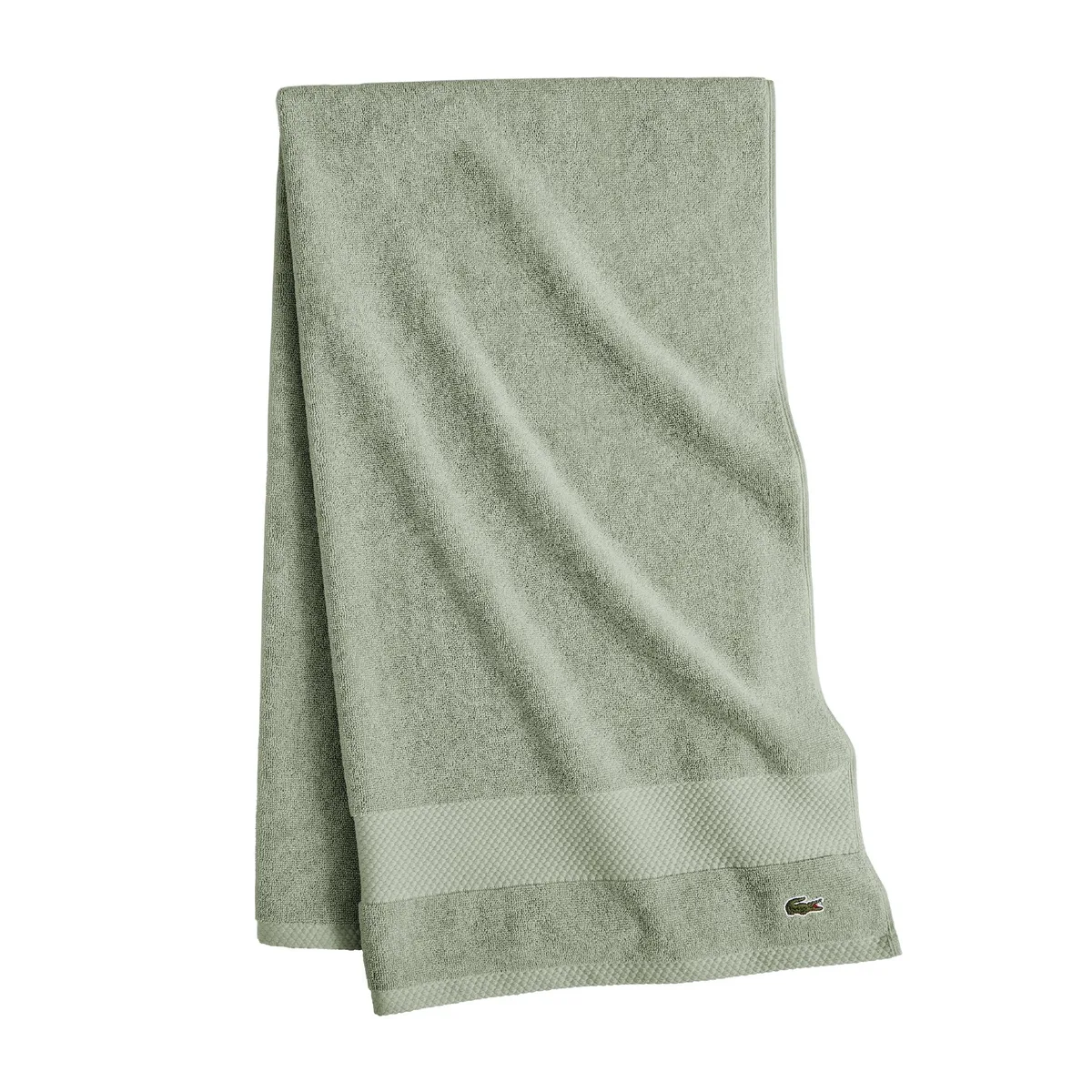 White rectangular bath towel with embroidered crocodile logo