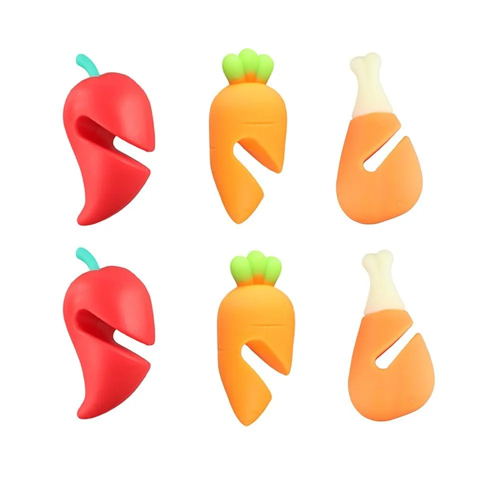 Six multicoloured silicone spill stoppers shaped like carrots peppers and chicken legs